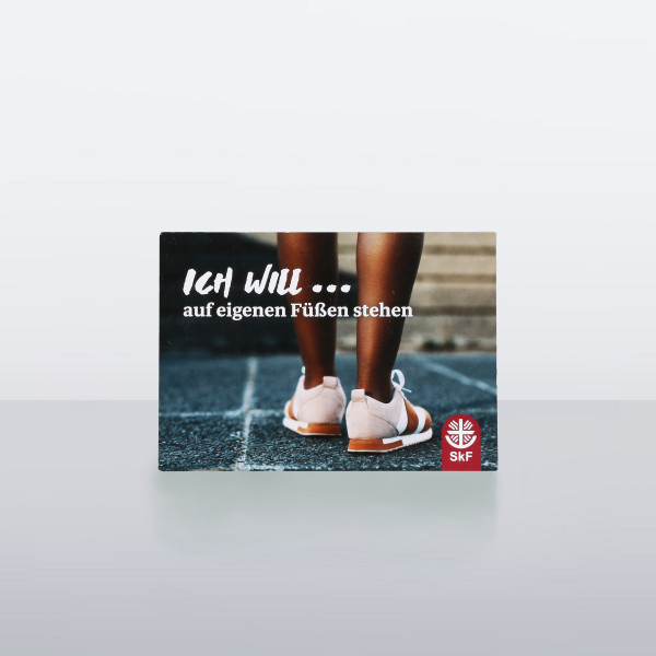 Karte mit der Aufschrift "Ich will ... auf eigenen Füßen stehen" und einer Abbildung von Füßen in Sneakers