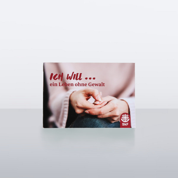 Postkarte mit der Aufschrift „Ich will ... ein Leben ohne Gewalt“ und einem Bild von ineinander gefalteten Händen