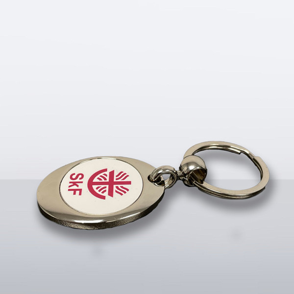 Schlüsselanhänger mit herausnehmbarem Einkaufschip und SkF-Logo